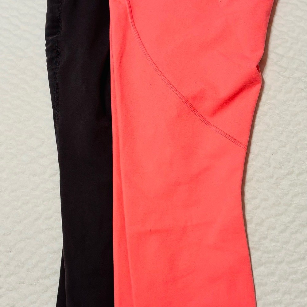 Two M FABLETICS Purple “Mila Pocket Capri” & Coral Leggings